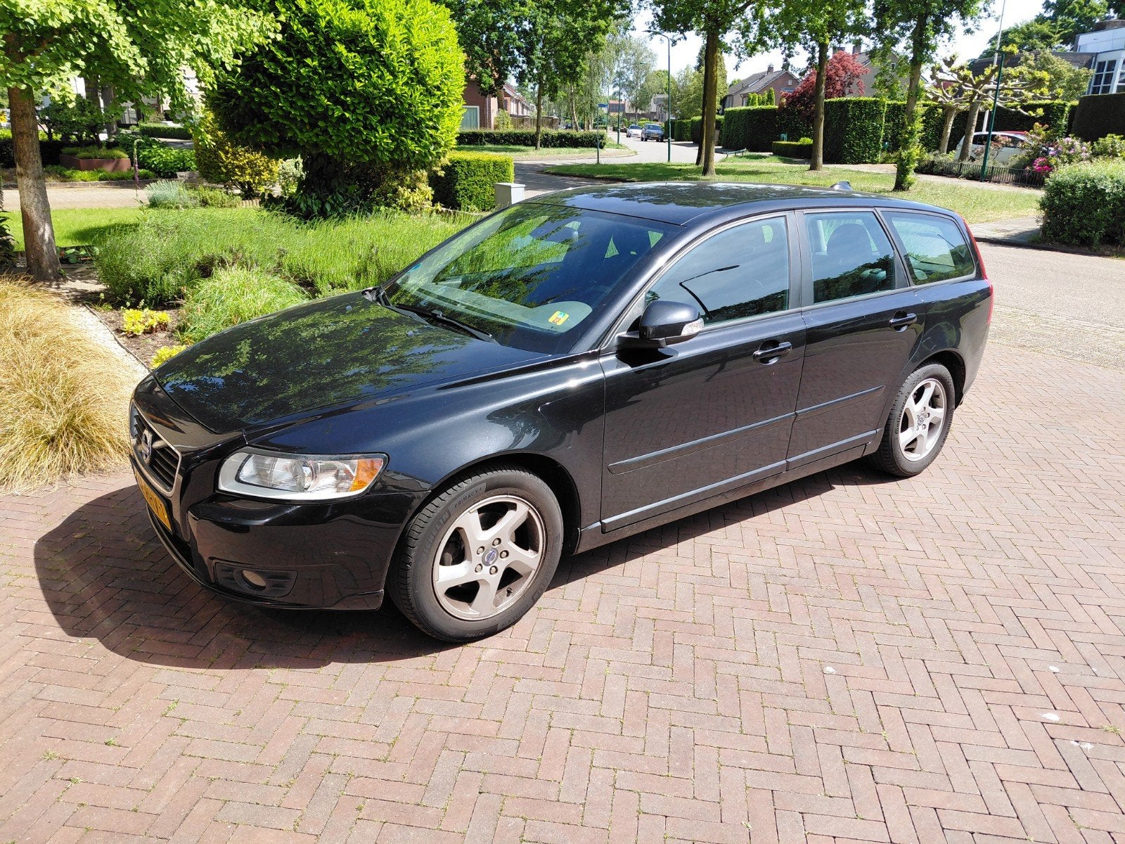 Volvo V50 2.0l benzine, 145pk, 2011, 263000km,Zwart metallic, Auto's, Volvo, Stof, Zwart, 4 cilinders, Zwart