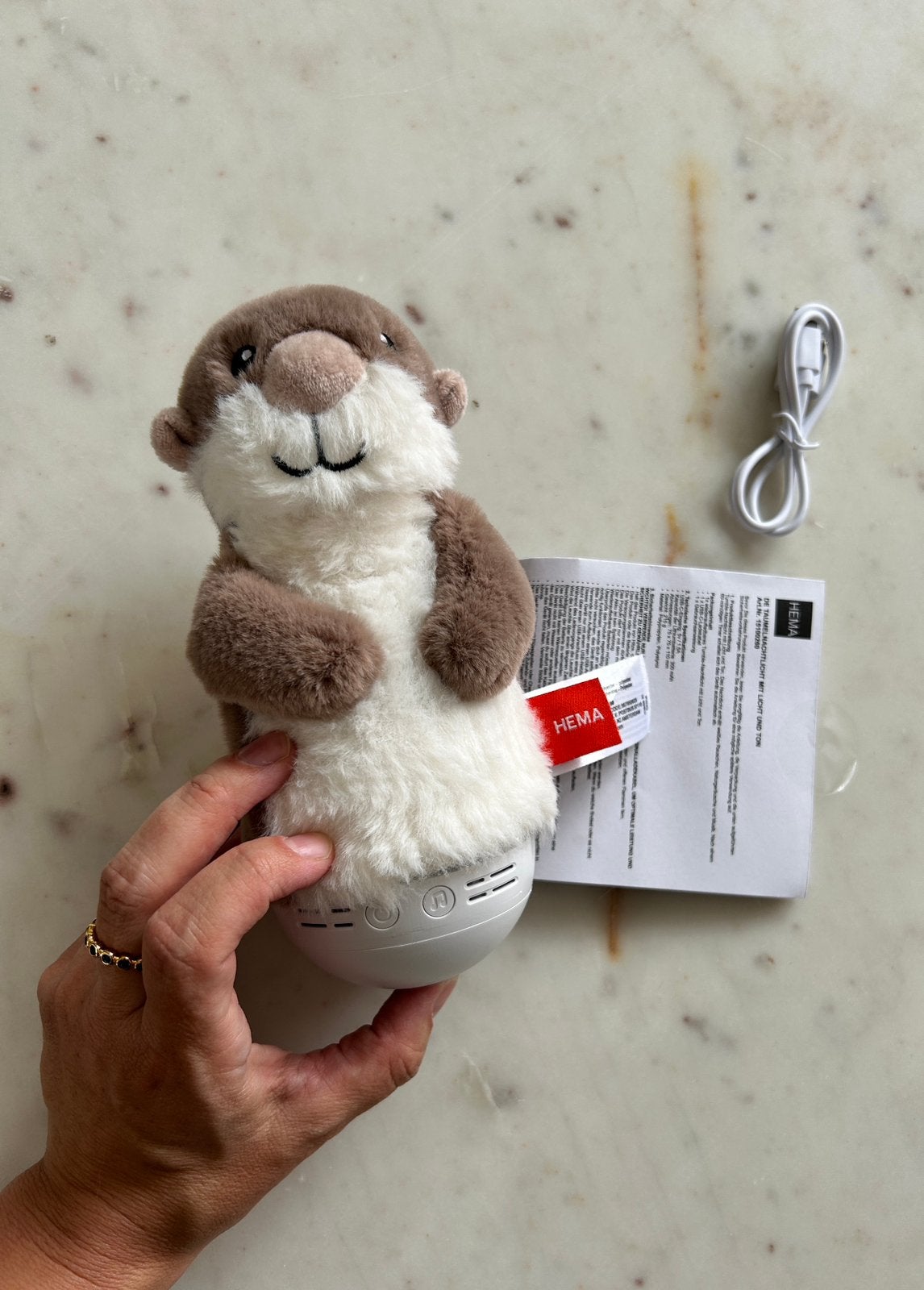 Hema pluche tuimelaar otter (white noise), Ophalen of Verzenden, Zo goed als nieuw, Overige typen, Met geluid
