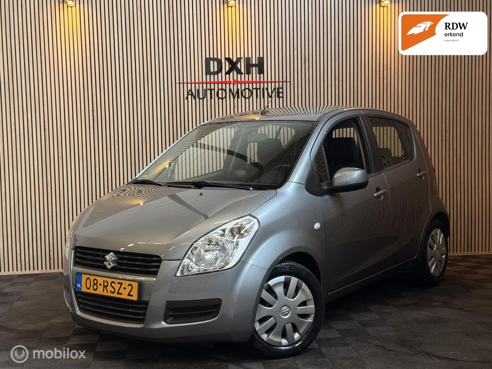 Suzuki Splash 1.0 VVT Comfort OrgNL 1eEIGENAAR! APK-9/2027, Euro 5, Stof, Gebruikt, 996 cc