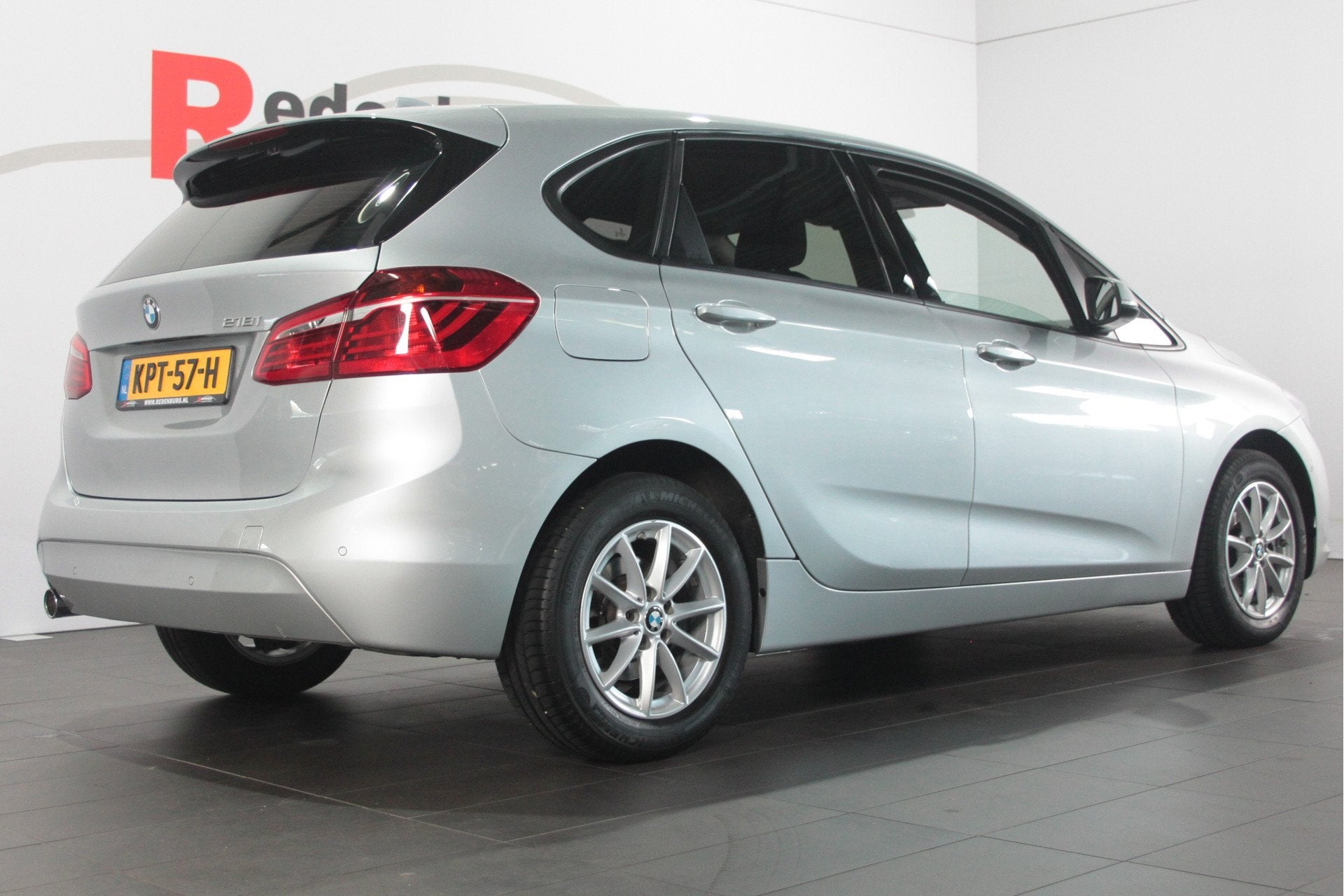 BMW 2 Serie Active Tourer 218i - Automaat - Bluetooth / Navi, Auto's, 1345 kg, 136 pk, Gebruikt, Euro 6