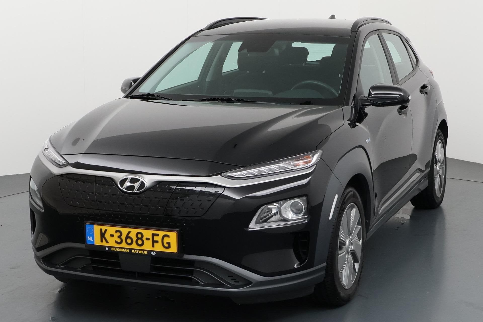 Hyundai Kona EV Comfort 64 kWh Krachtig en stijlvol elektris, Auto's, Stof, Gebruikt, Zwart, Origineel Nederlands