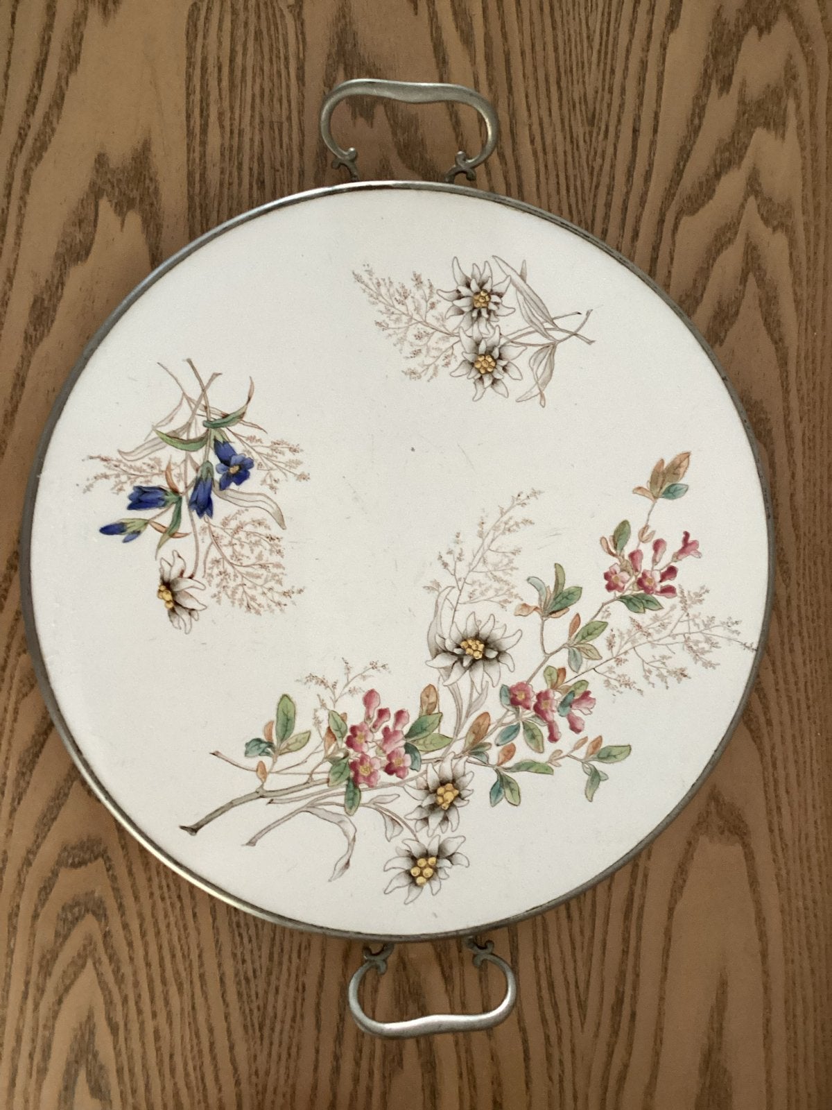 Vintage keramisch dienblad met metalen rand en bloemdecor., Ophalen of Verzenden