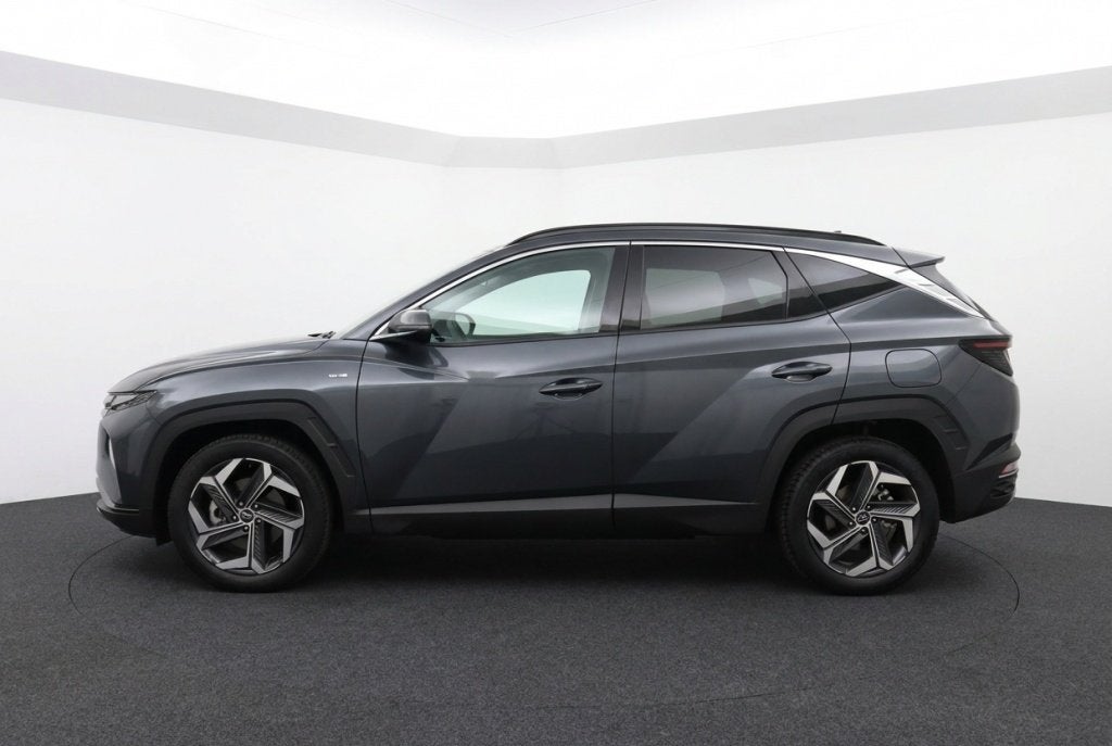 Hyundai Tucson 1.6 T-GDI PHEV Comfort 265pk l Camera l Blind, Auto's, Hyundai, Automaat, Stof, Gebruikt, 4 cilinders