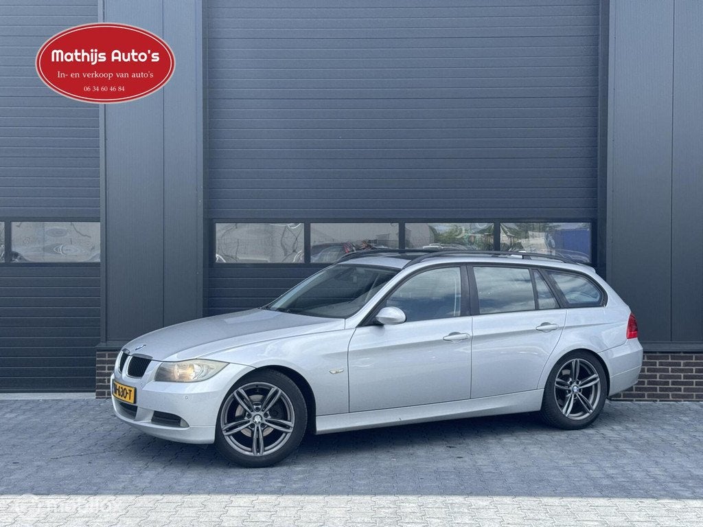 BMW 3-serie Touring 318i High Executive Pano Trekhaak! Navi!, Auto's, 13 km/l, Achterwielaandrijving, 4 cilinders, 129 pk
