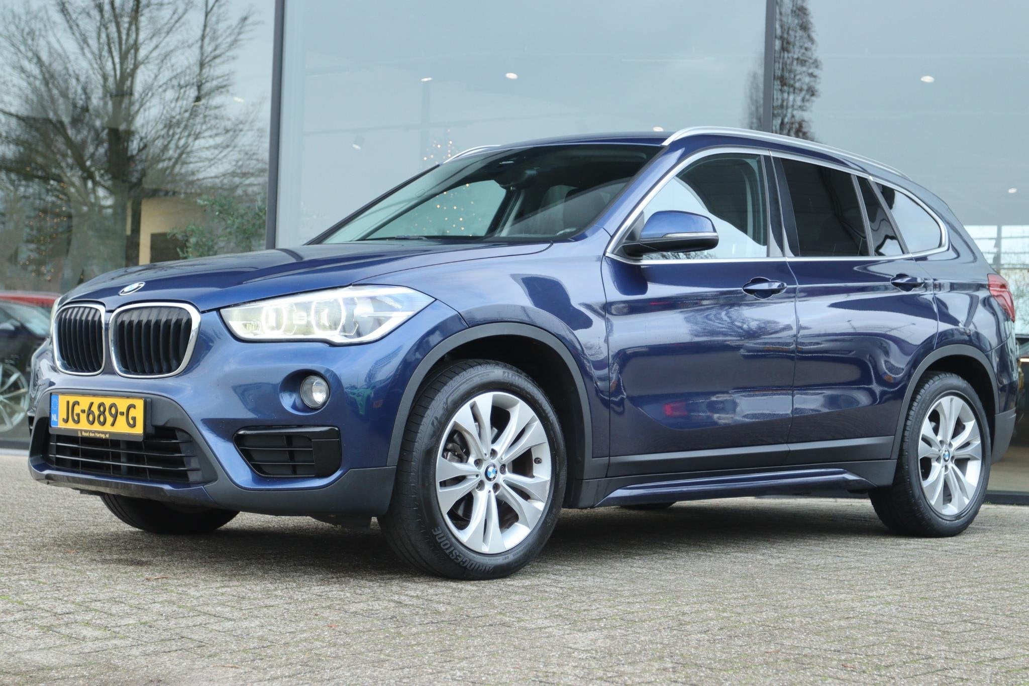 BMW X1 SDRIVE16D CORPORATE LEASE SPORT | LED | LEDER | HUD |, Auto's, Gebruikt, Euro 6, Blauw, 116 pk
