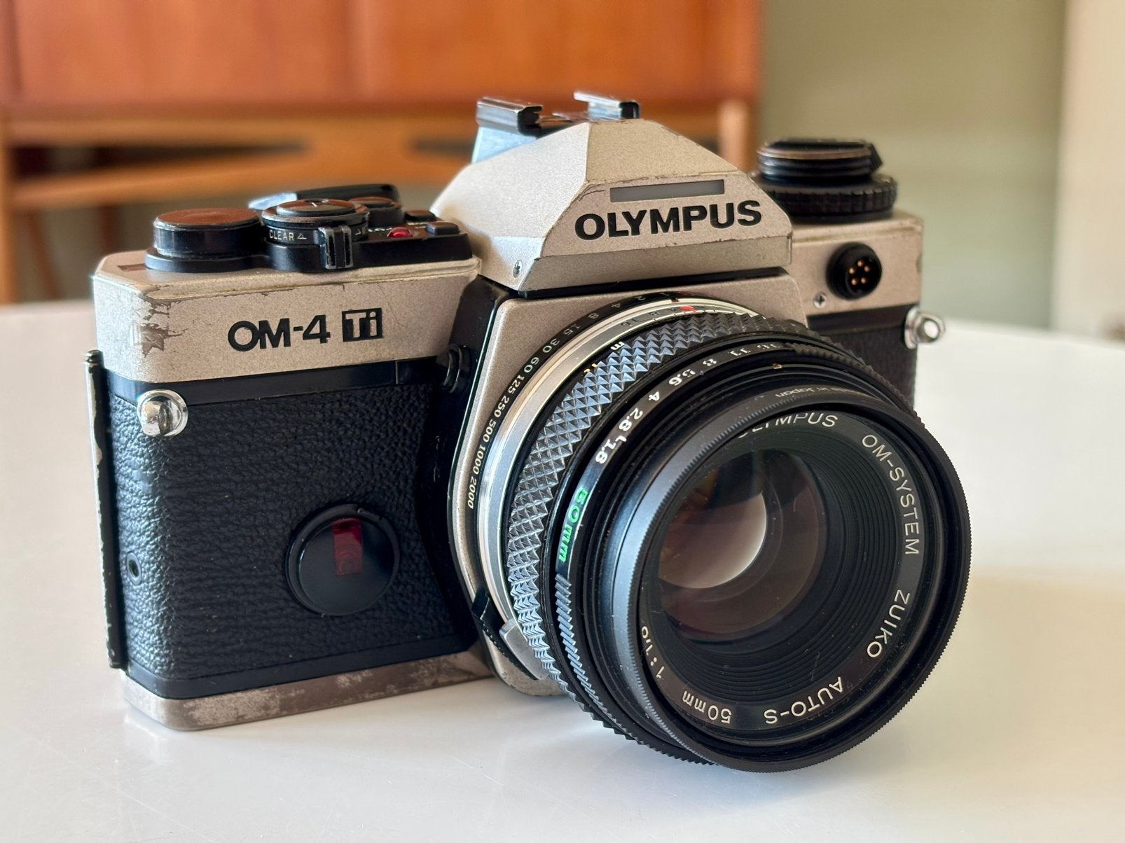 Olympus OM-4 Ti (Titanium) set met Zuiko 50mm f/1.8, Ophalen of Verzenden, Gebruikt, Spiegelreflex, Olympus