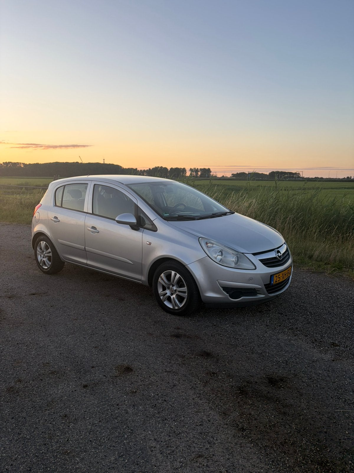 Opel Corsa 1.2 16V 5D WR 2007 Grijs, Voorwielaandrijving, 4 cilinders, 1229 cc, 49 €/maand