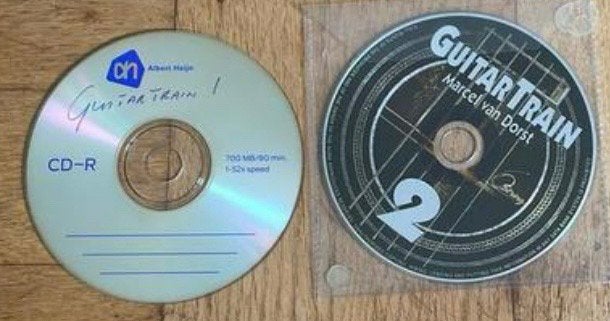 Guitar Train CD's 1&2 Marcel van Dorst beginnende gitaarles, Muziek en Instrumenten, Bladmuziek, Ophalen of Verzenden, Zo goed als nieuw