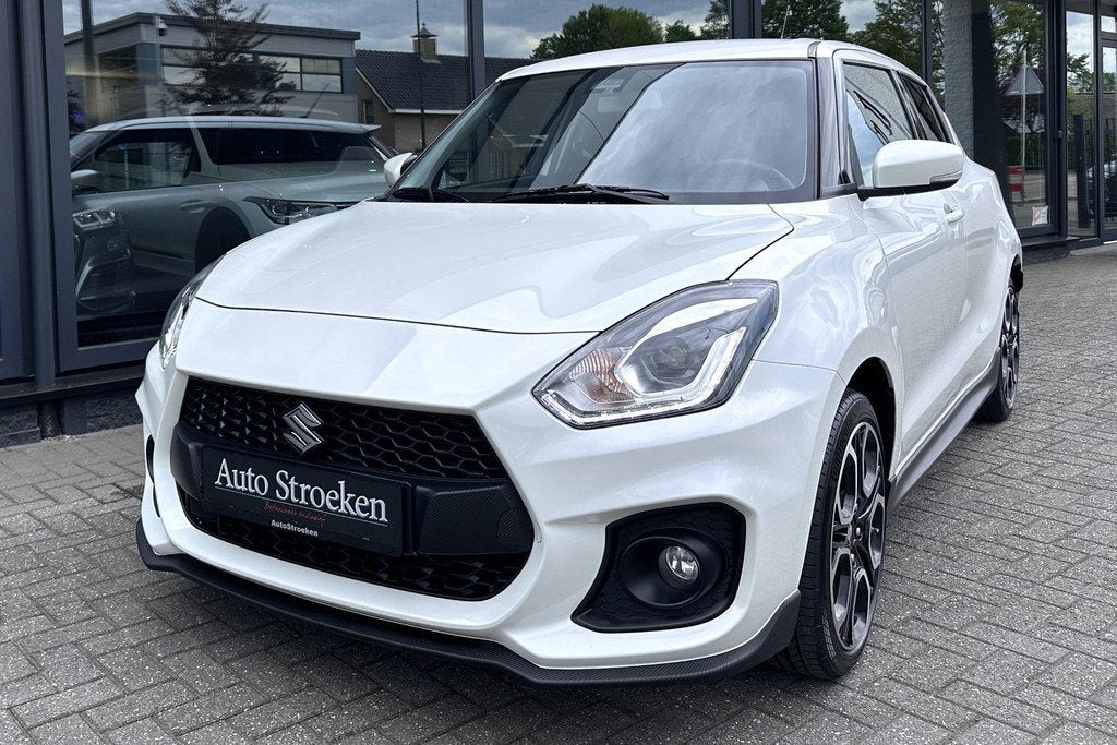 Suzuki Swift 1.4 Sport Smart Hybrid Camera Navigatie Carbon, Voorwielaandrijving, Stof, Gebruikt, Euro 6
