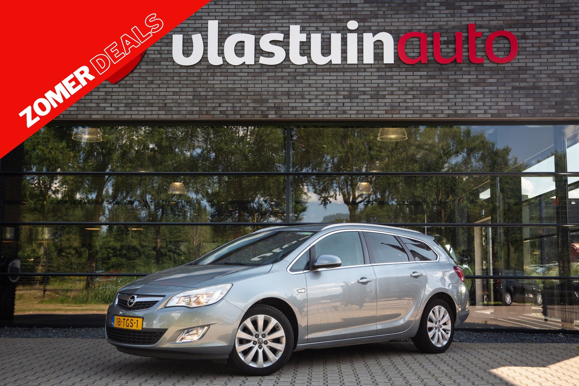 Opel Astra Sports Tourer 1.4 Turbo Cosmo (bj 2012), Voorwielaandrijving, Euro 5, Stof, Gebruikt