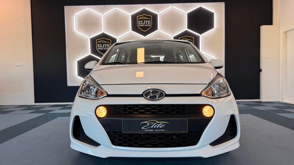 Hyundai I10 1.0i Comfort, Auto's, Hyundai, Voorwielaandrijving, Gebruikt, 4 stoelen, Wit