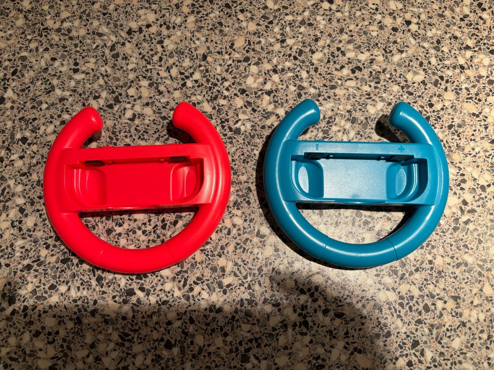 Nintendo Switch stuurwiel (rood en blauw), Ophalen of Verzenden, Zo goed als nieuw, Switch, Stuurtje of Sportattribuut