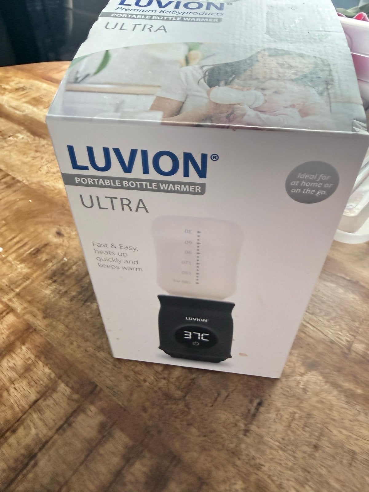 Luvion Ultra Draagbare Flessenwarmer - Zo goed als nieuw, Flessen- of potjesverwarmer, Luvion, Ophalen of Verzenden, Zo goed als nieuw