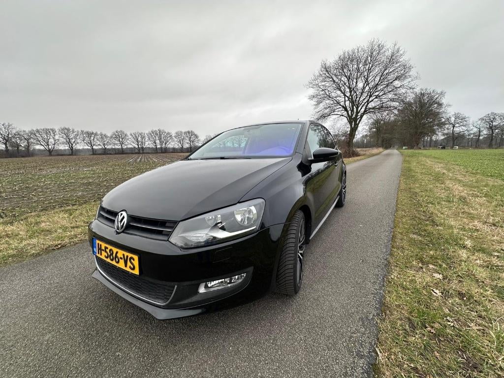 Volkswagen Polo 1.2 TSI 77KW 2010 Zwart, Auto's, Voorwielaandrijving, 40 €/maand, Zwart, Zwart