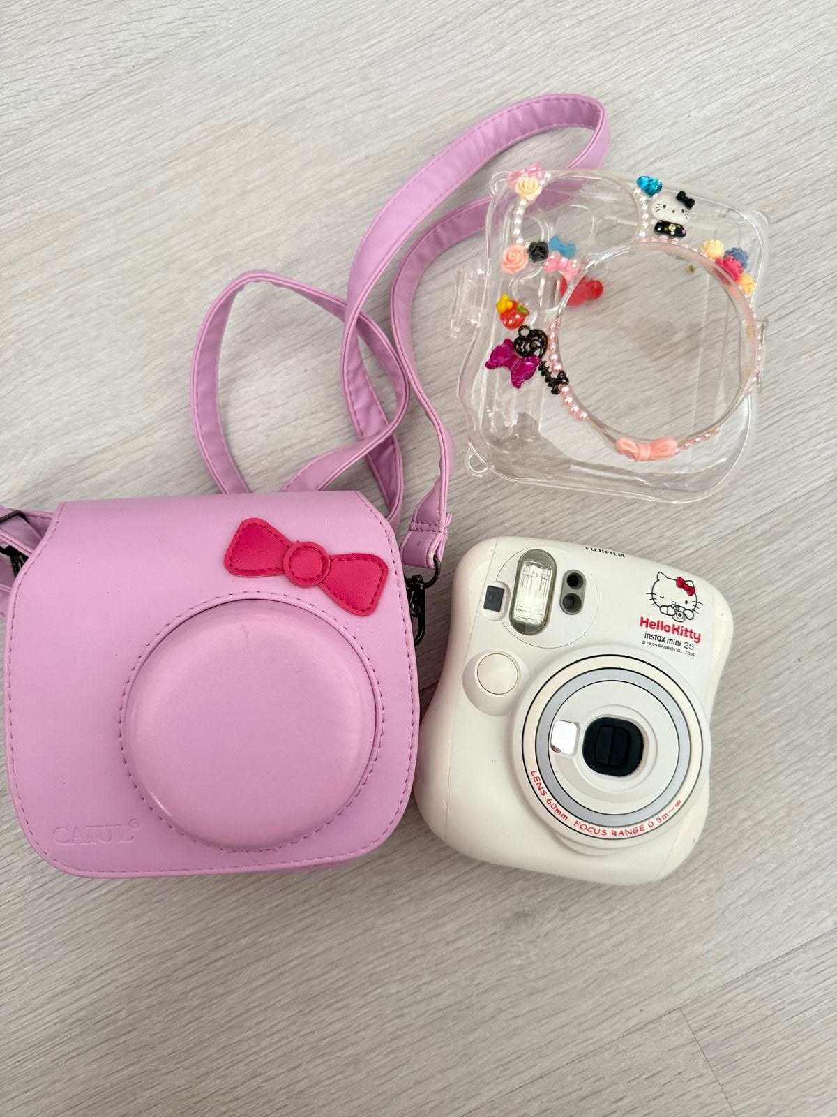 Hello Kitty Fujifilm Instax Mini 25 met accessoires, Gebruikt, Compact, Ophalen of Verzenden, Fuji