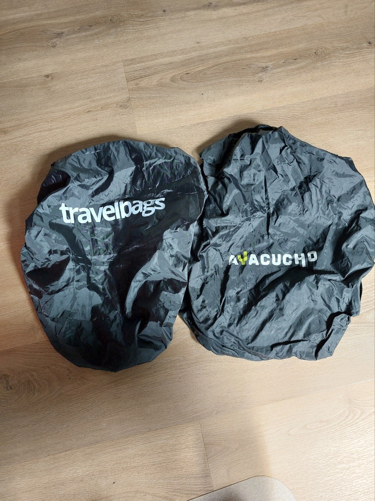 2 Regenhoezen voor rugzak (standaard model), Travelbags, Ayacucho, Ophalen of Verzenden, Zo goed als nieuw