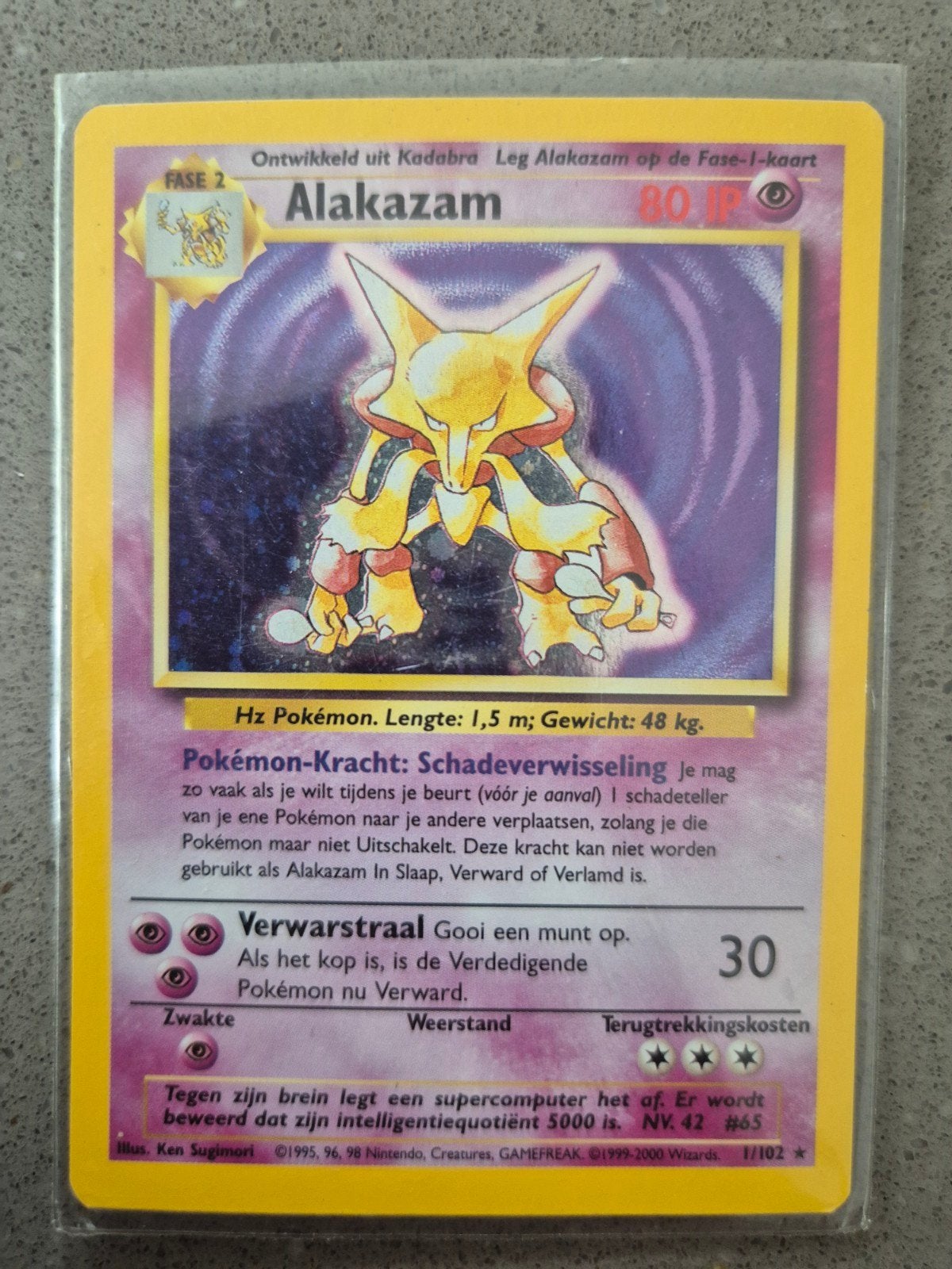 Alakazam 1/102 Holo Rare -NL Base Set Pokémon Kaart, Hobby en Vrije tijd, Ophalen of Verzenden, Gebruikt, Losse kaart, Foil