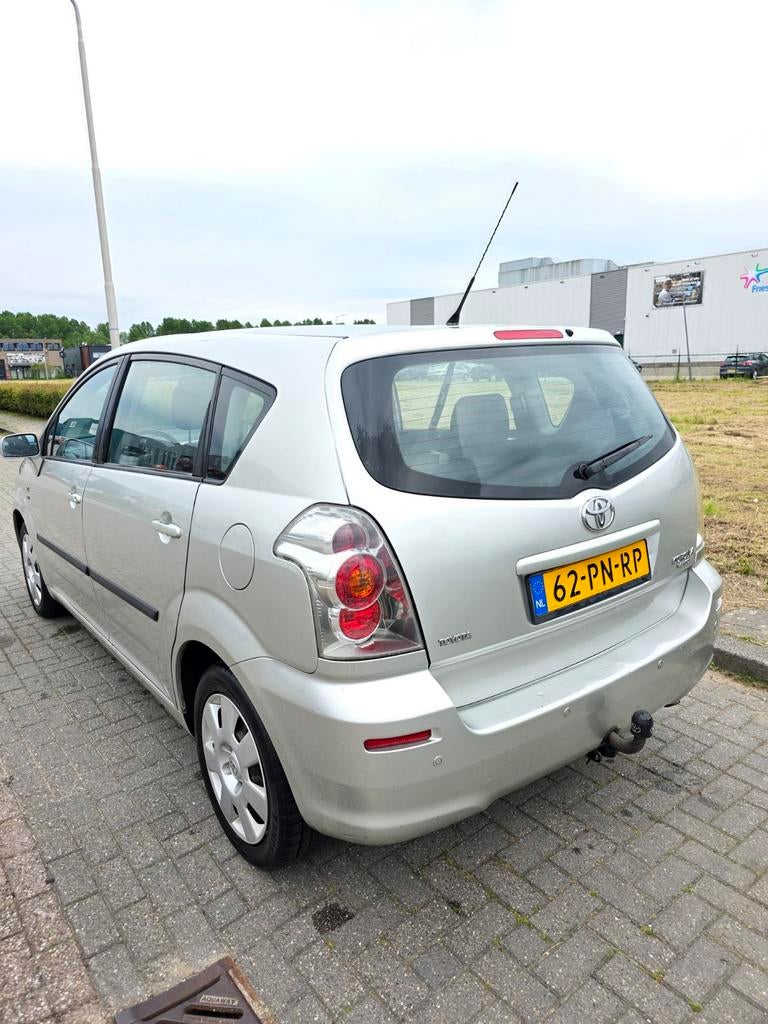 Toyota Corolla Verso 1.8 Vvt-i AUT 7P 2004 Grijs, Auto's, Zwart, 4 cilinders, 129 pk, 7 stoelen