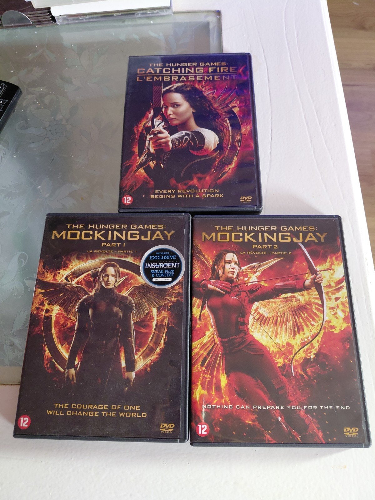 Hunger Games Catching Fire & Mockingjay Part 1 and 2 dvd's., Cd's en Dvd's, Vanaf 12 jaar, Ophalen of Verzenden, Zo goed als nieuw