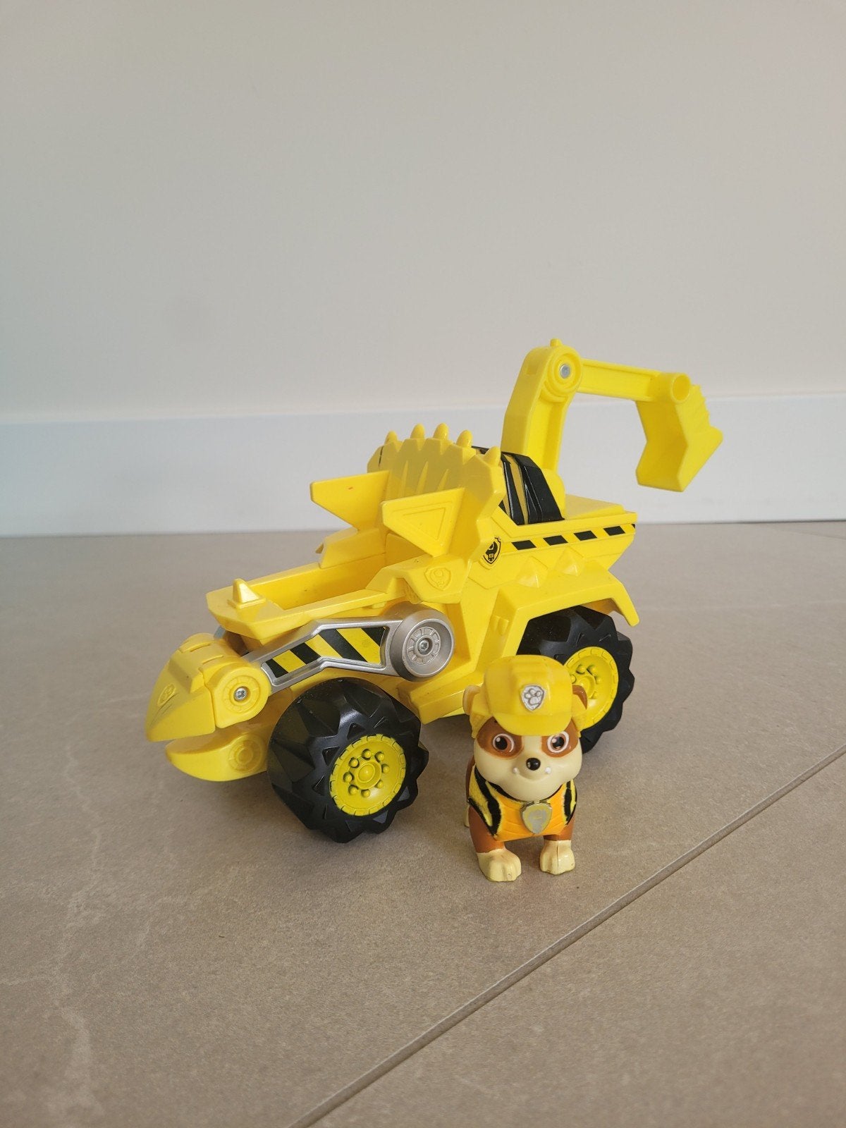 Paw Patrol Rubble Dino Rescue voertuig met figuur, Ophalen of Verzenden, Zo goed als nieuw