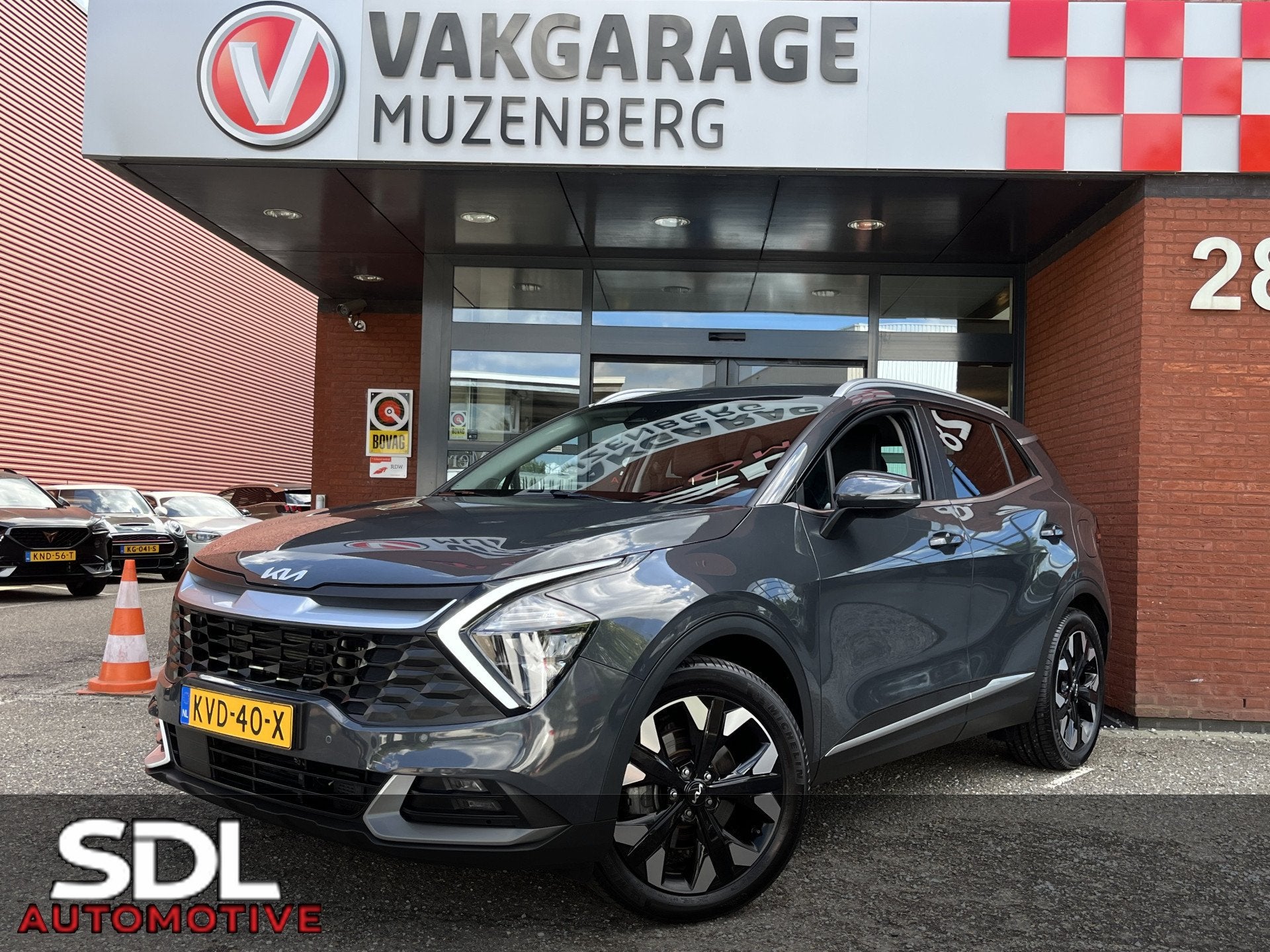 Kia Sportage 1.6 T-GDi Plug-in Hybrid AWD DynamicPlusLine //, Auto's, Automaat, Gebruikt, 4 cilinders, Leder en Stof