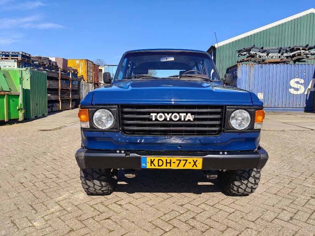 Toyota Landcruiser HJ60 1981 Wegenbelasting /milieuzone vrij, Auto's, Trekhaak, Blauw, Leder en Stof, Bruin