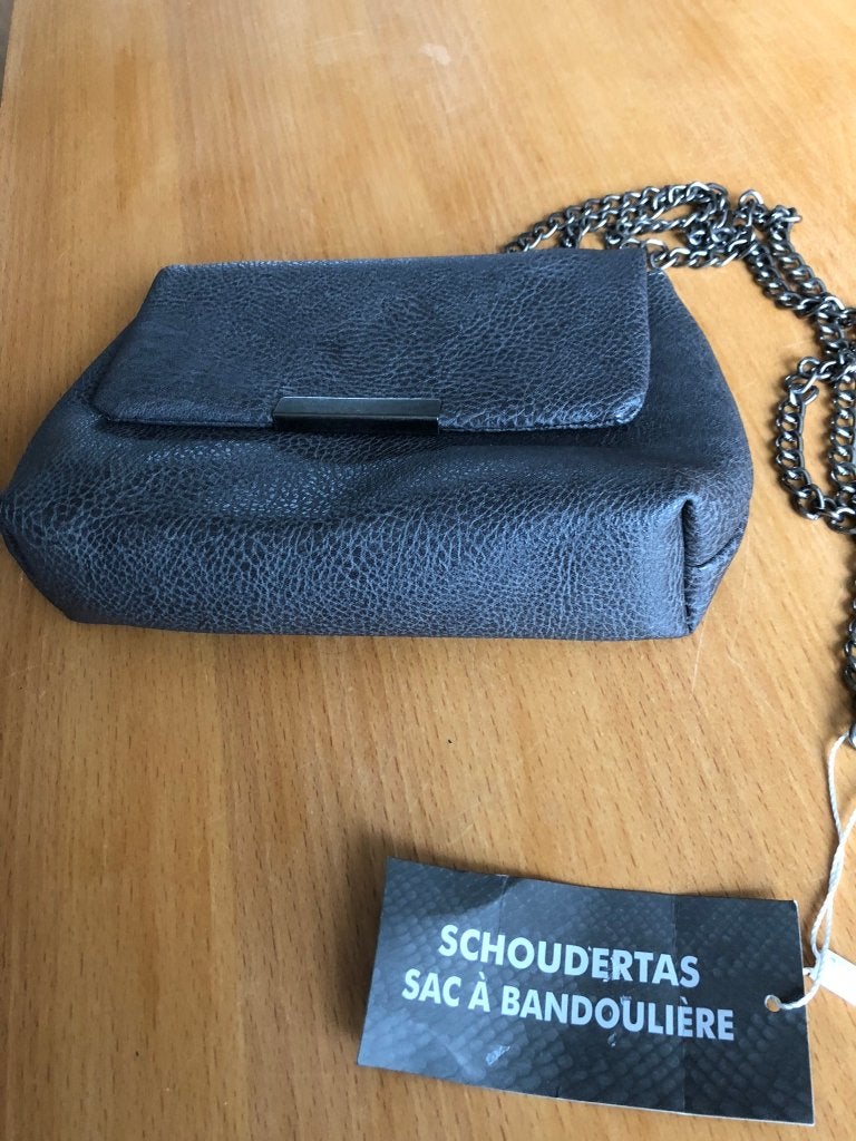 Te koop leuk grijs tasje.(nieuw)., Ophalen of Verzenden, Nieuw, Grijs