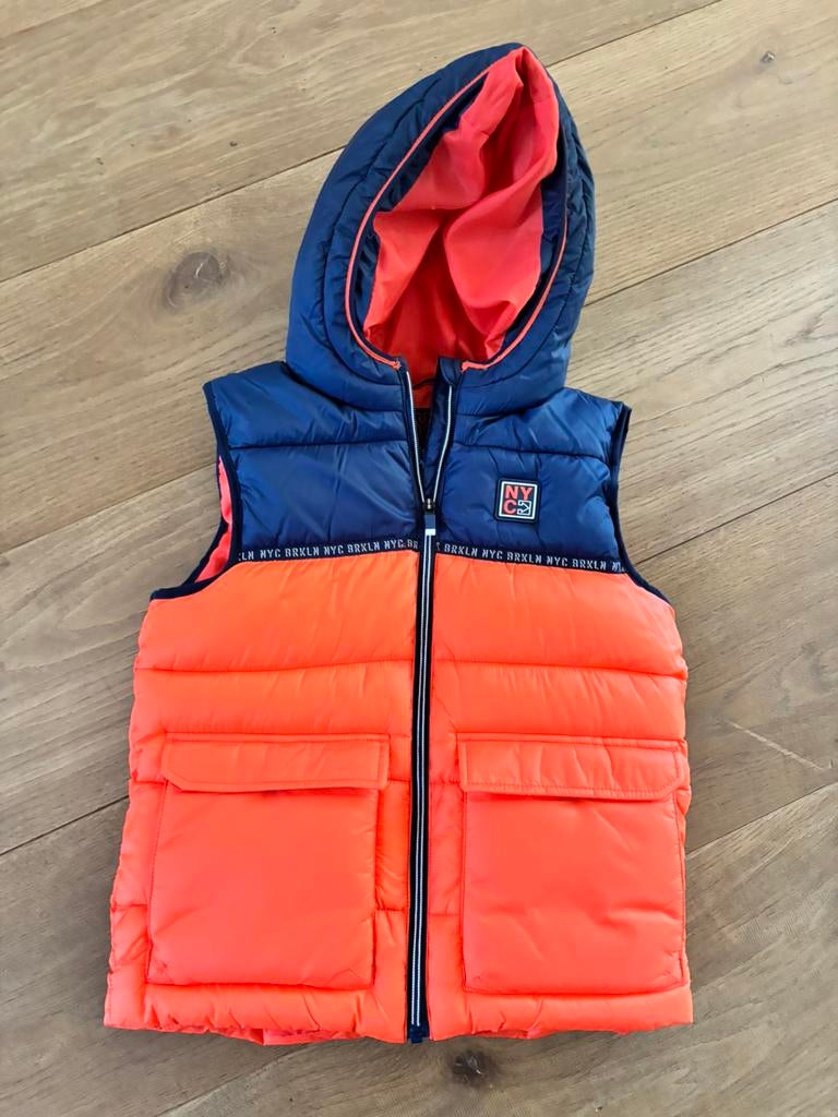 Bodywarmer maat 140. Oranje en blauw, Ophalen of Verzenden, Nieuw, Jongen of Meisje, Jas