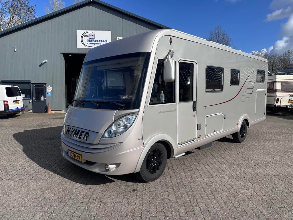 Hymer B694 4 persoons xxl garage, airco, levelsysteem., Caravans en Kamperen, Ringverwarming, Fiat, 7 tot 8 meter, Bedrijf