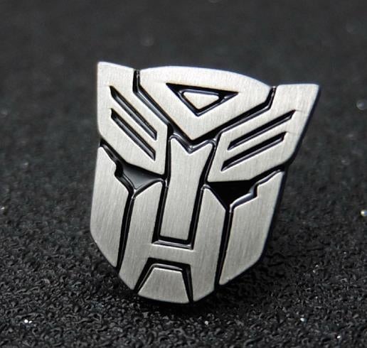 TRANSFORMERS Autobots logo Enamel Pin in doosje, Overige generaties, Ophalen of Verzenden, Nieuw