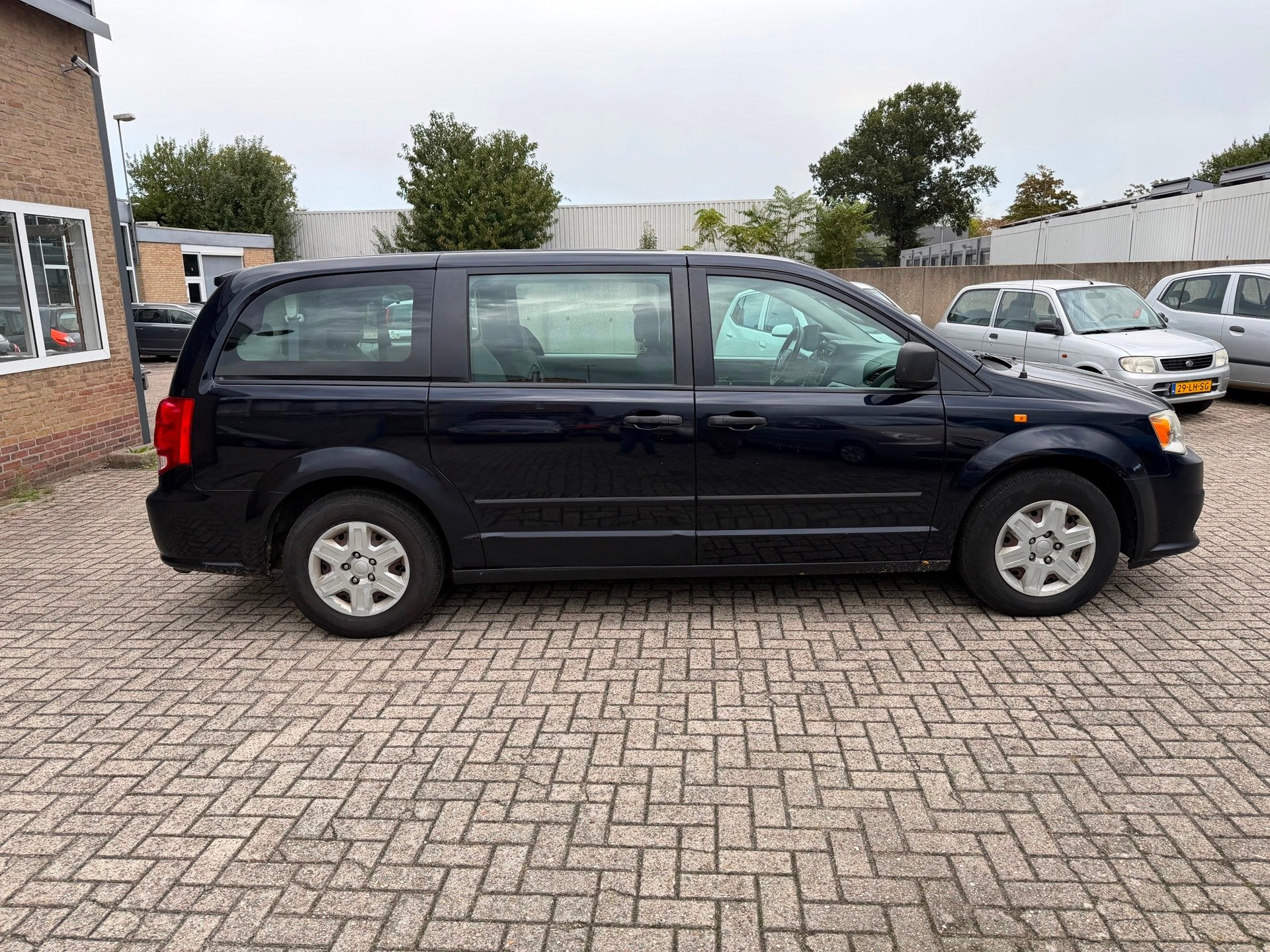 Dodge Grand Caravan 3.6 V6// goede auto// Leest tekst, Auto's, Euro 5, Zwart, Blauw, 7 stoelen