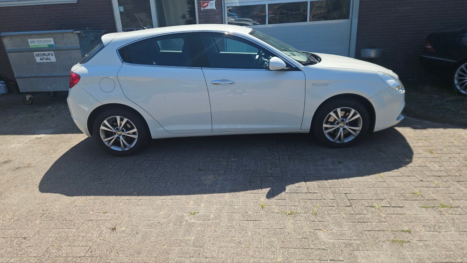 Alfa Romeo Giulietta 1.4 Turbo Multi AIR 2010 Wit, Auto's, Voorwielaandrijving, Stof, Zwart, 4 cilinders