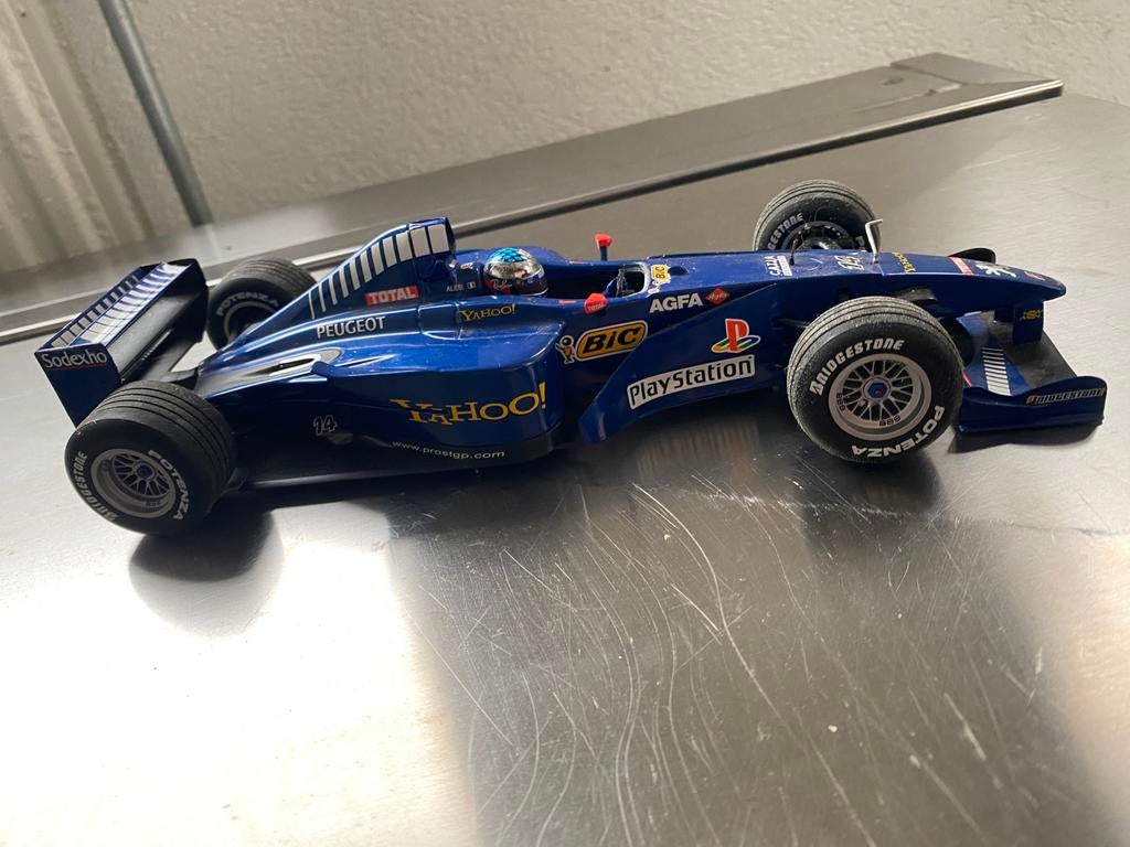 Prost Peugeot AP03, Hobby en Vrije tijd, Modelauto's | 1:24, Ophalen of Verzenden, Zo goed als nieuw, Overige merken