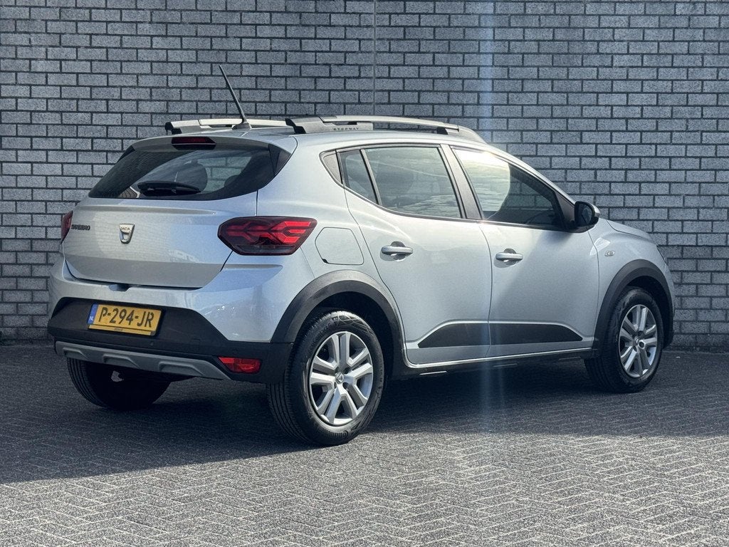 Dacia Sandero Stepway 1.0 TCe 90 Comfort | Navigatie | Parke, Auto's, Dacia, Gebruikt, Met garantie (alle), 49 €/maand, Origineel Nederlands