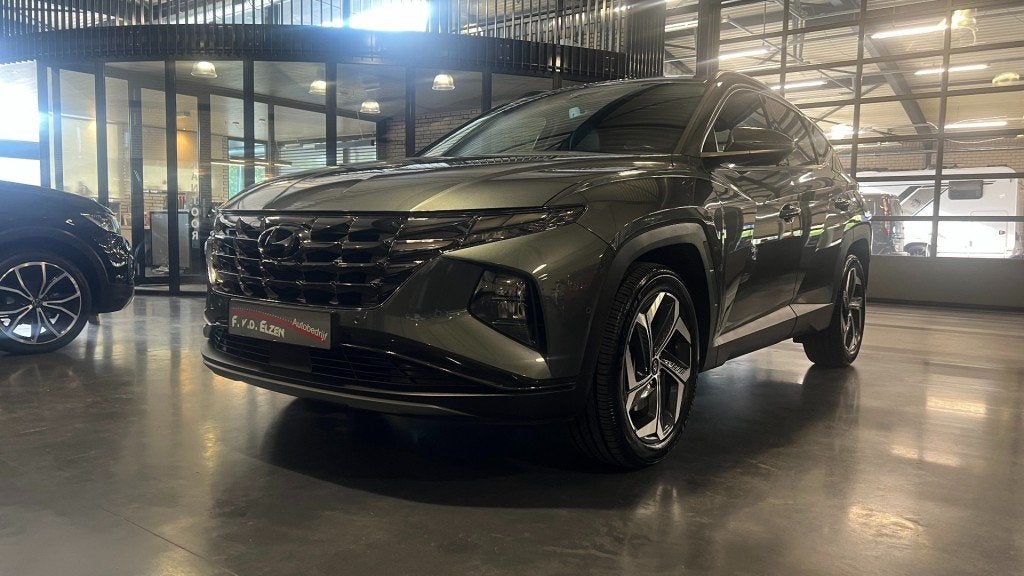 Hyundai TUCSON 1.6 T-GDI HEV Premium 230 Pk Automaat 1650 kg, Auto's, Gebruikt, Huisgarantie, 4 cilinders, Met garantie (alle)