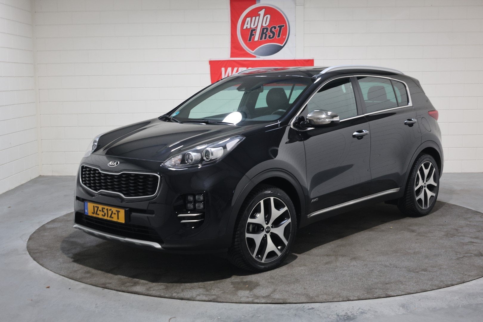 Kia Sportage 1.6 T-GDI 4WD GT-Line First Edition Automaat De, Auto's, Dealer onderhouden, Gebruikt, 4 cilinders, Parkeersensor