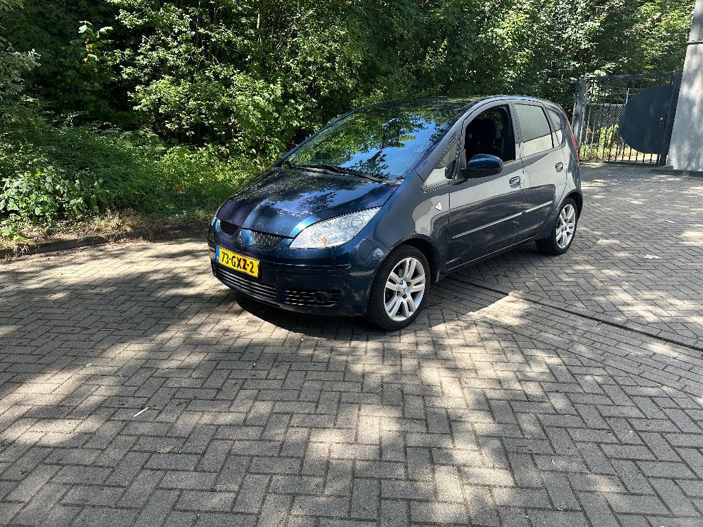 Mitsubishi Colt 1.3 incharge+ 5 deurs 175DKM, Stof, 68 pk, 1000 kg, Handgeschakeld