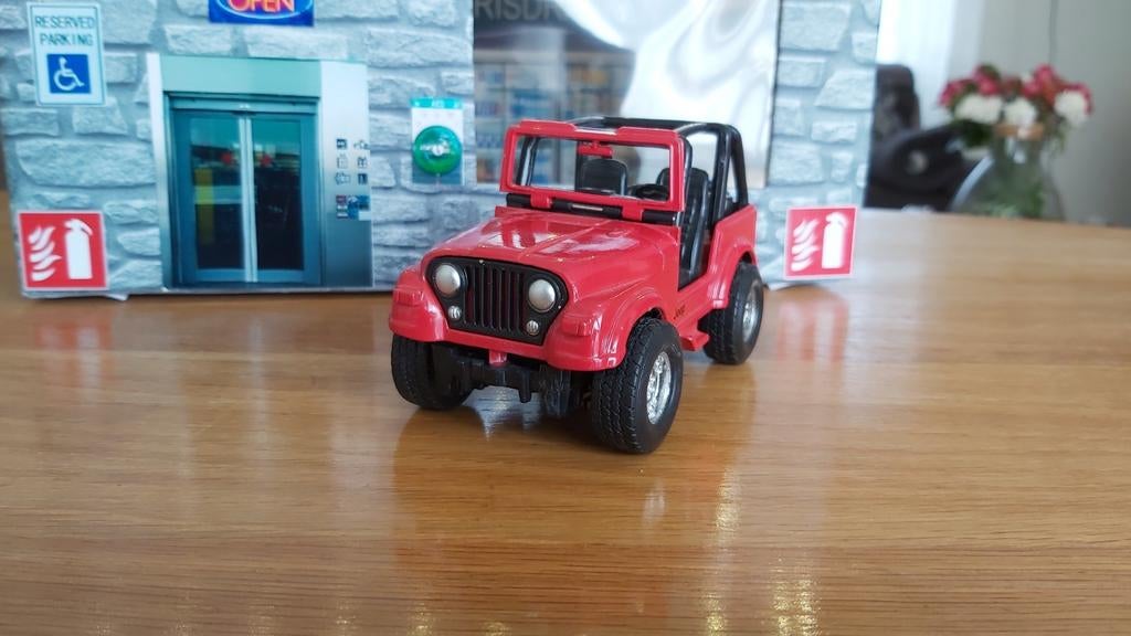Jeep Wrangler schaalmodel rood, Ophalen of Verzenden, Gebruikt, Auto, Overige merken