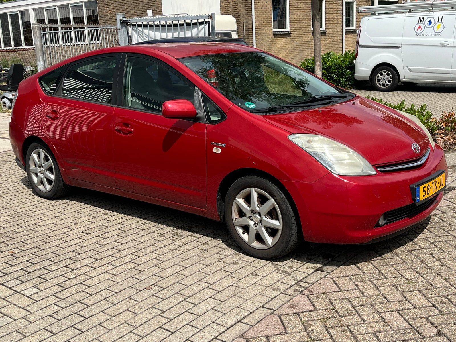 Toyota Prius 1.5 HSD 2006 Rood, Auto's, 1497 cc, 4 cilinders, 23 km/l, Origineel Nederlands