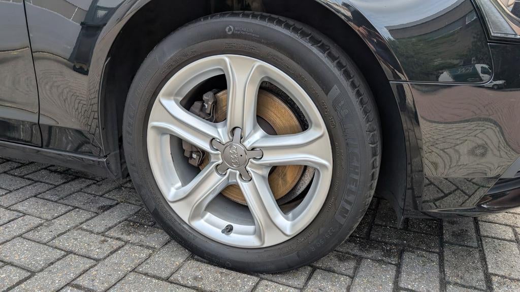 Audi A4 Avant 1.8 TFSI 125kW | Panoramadak | Cruise | Navi, Voorwielaandrijving, Zwart, 4 cilinders, Zwart