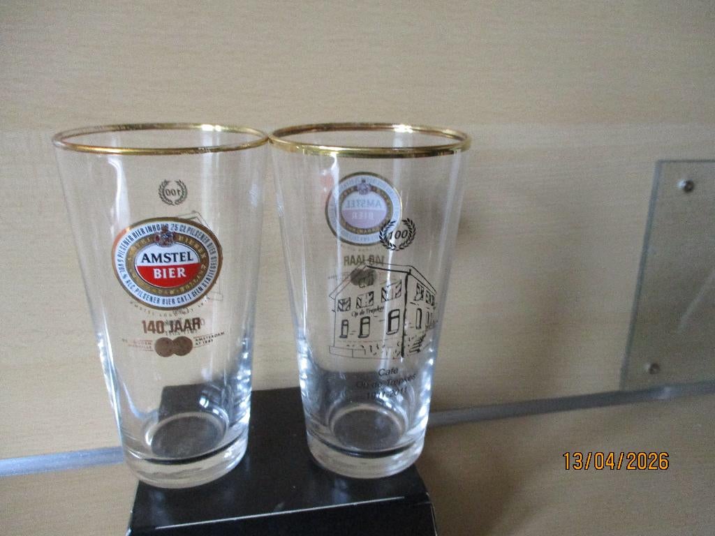 2 Aparte AMSTEL Glazen DD.Cafe op de Trepkes 1911-2011, Ophalen of Verzenden, Zo goed als nieuw, Bierglas