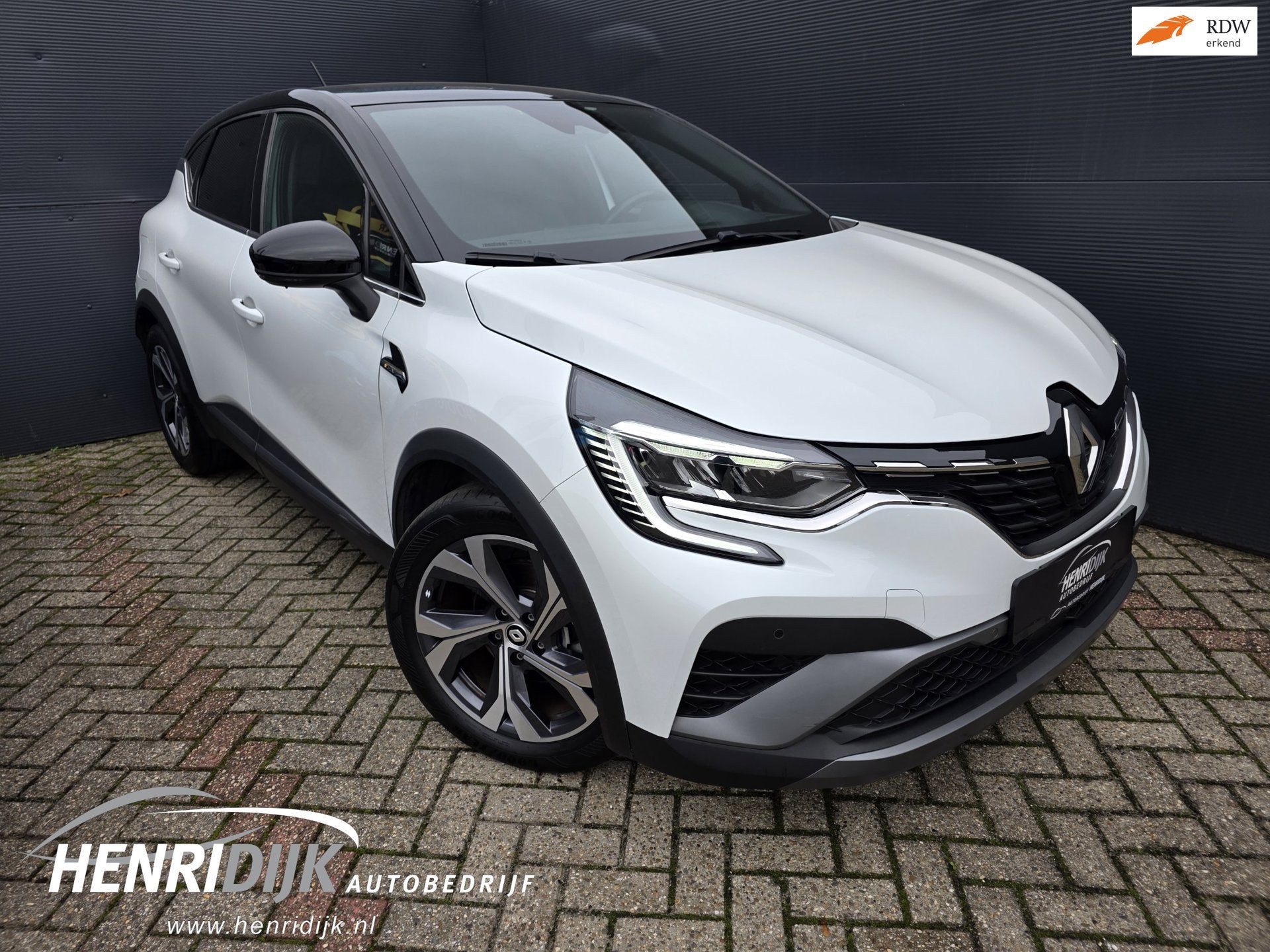 Renault Captur 1.6 E-Tech Hybrid 145 R.S. Line Navi / Camera, Auto's, 145 pk, Gebruikt, Zwart, Leder en Stof
