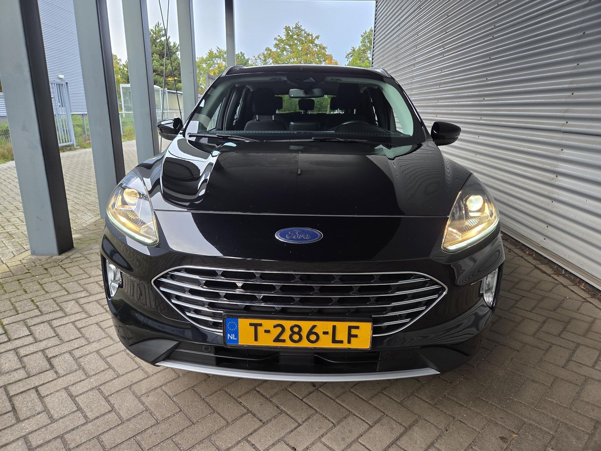 Ford Kuga 2.5 PHEV Titanium, Auto's, Dealer onderhouden, Gebruikt, Euro 6, Zwart