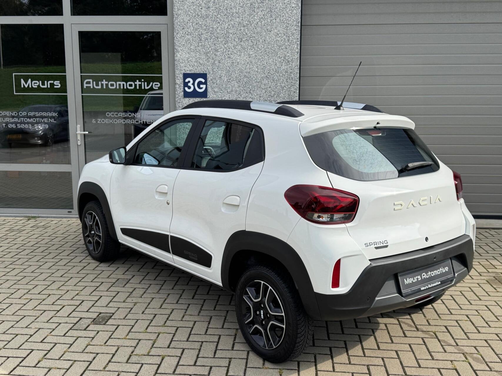 Dacia Spring Comfort Plus 27 kWh SOH 93% CCS/Navi/Camera/Car, Auto's, Dealer onderhouden, Gebruikt, Zwart, 38 min