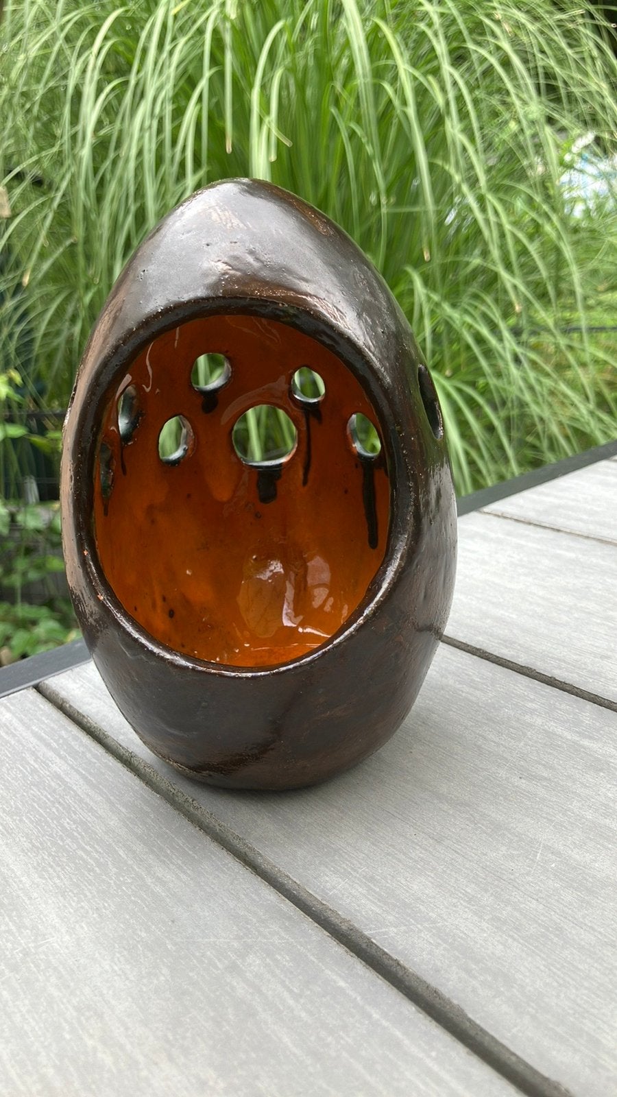 Egg waxinelichthouder; bronskleurig/oranje glazuur., Ophalen of Verzenden, Zo goed als nieuw, Oranje, Waxinelichthouder