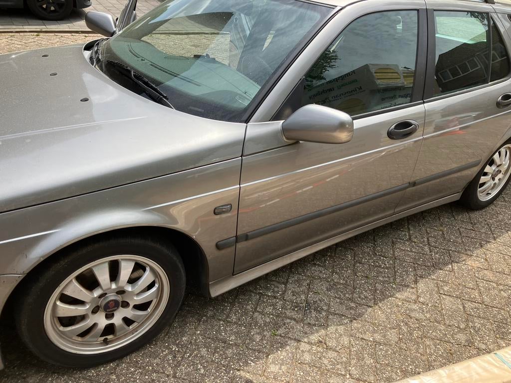Saab 9-5 2.3 Turbo Aero Estate AUT 2002 Grijs, 1610 kg, Zwart, 4 cilinders, 2290 cc