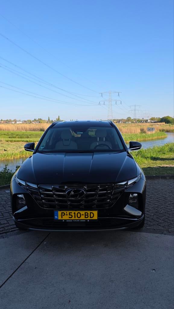 Hyundai Tucson 1.6 T-gdi HEV 230pk Aut. 2022 Zwart, Auto's, Hyundai, Adaptive Cruise Control, Beige, 4 cilinders, 179 pk