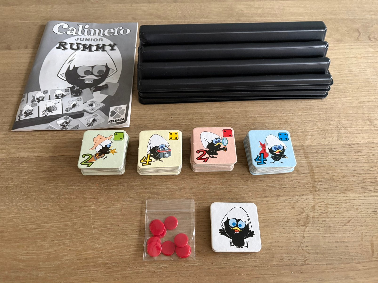 Super leuke vintage Calimero rummikub uit 1997, Hobby en Vrije tijd, Ophalen of Verzenden, Zo goed als nieuw
