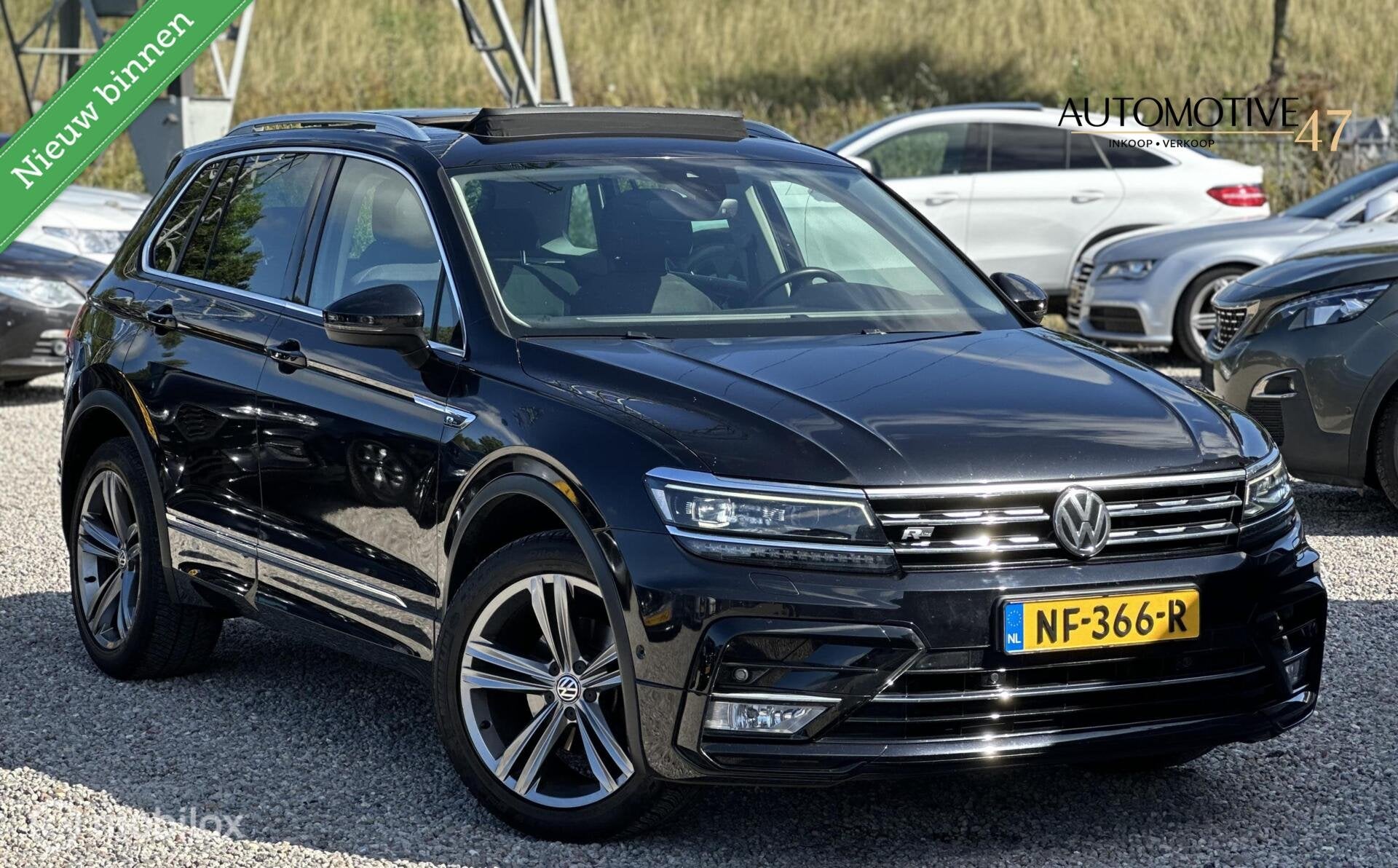 Volkswagen Tiguan 1.4 TSI Comfortline Busines R Line, Auto's, Euro 6, 4 cilinders, 150 pk, Zwart