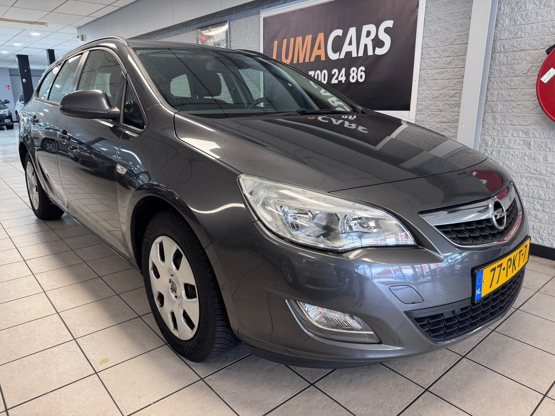 Opel Astra Sports Tourer 1.4 Edition | Nieuwe APK | Cruise |, Auto's, Voorwielaandrijving, Euro 5, 101 pk, Gebruikt